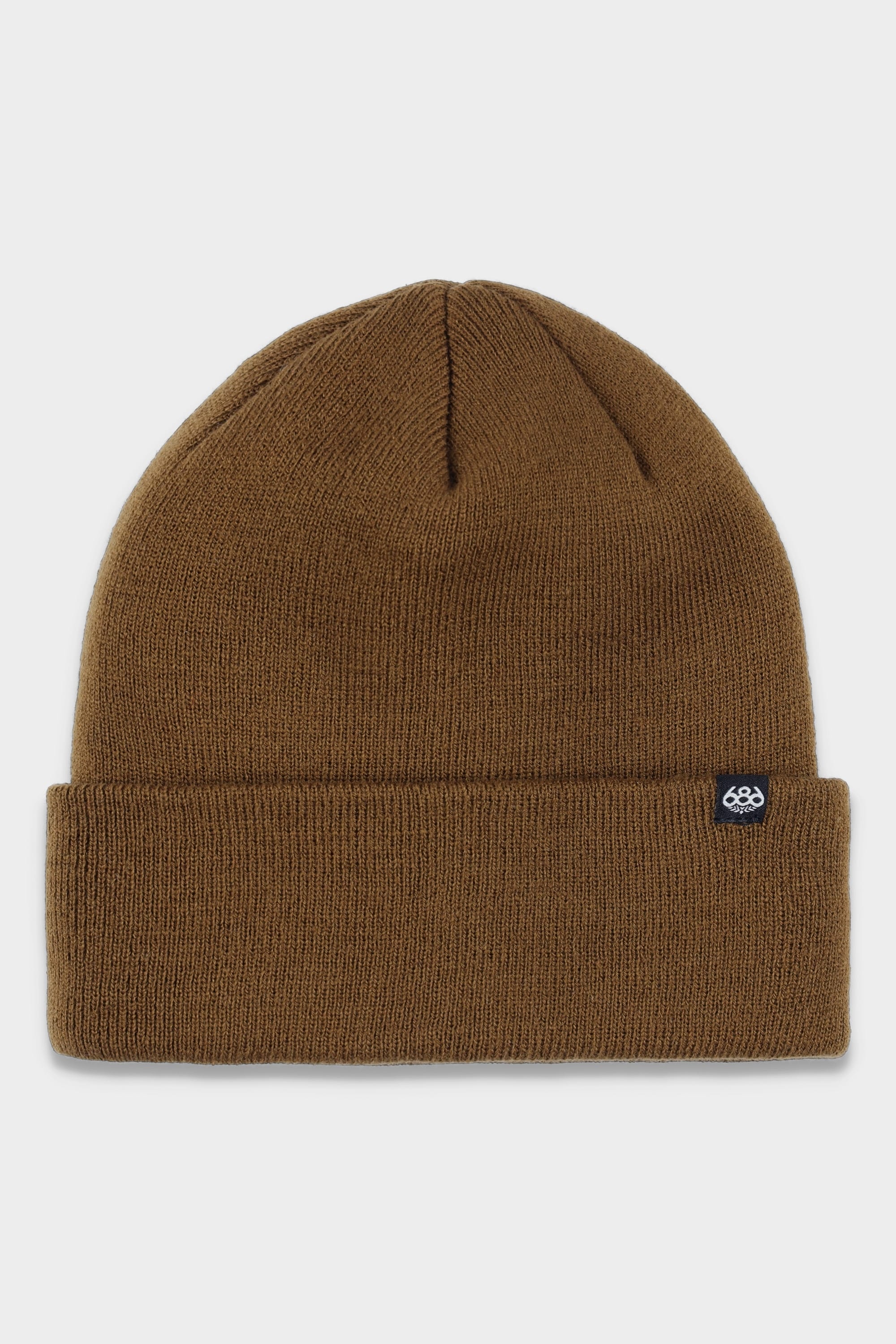 The 686 Standard Roll Up Beanie by 686 is a brown knit hat with a folded brim and a small black tag featuring a white logo on the left side, shown against a white background.