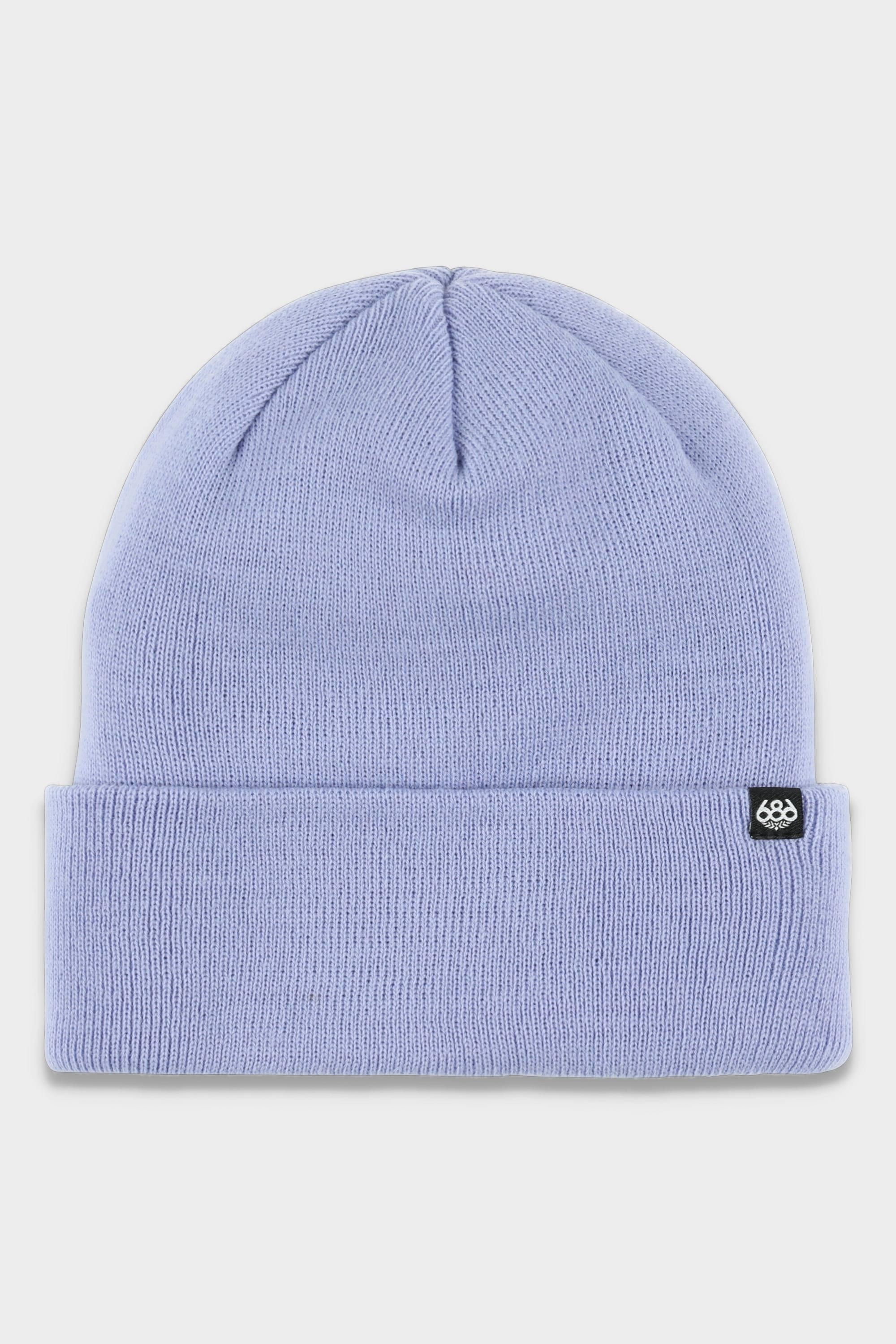 The 686 Standard Roll Up Beanie by 686 is a light purple knit hat with a folded brim, featuring a small black rectangular tag with a white logo on the edge. The beanie is displayed flat on a white background.