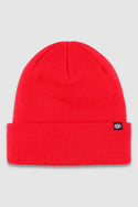 The 686 Standard Roll Up Beanie by 686 is a bright red knit hat with a folded cuff and a small black rectangular tag with a white logo, shown on a light gray background.