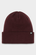 The 686 Standard Roll Up Beanie by 686 is a maroon knit hat with a standard folded brim and a small black tag with a white logo on the side, shown on a plain white background.