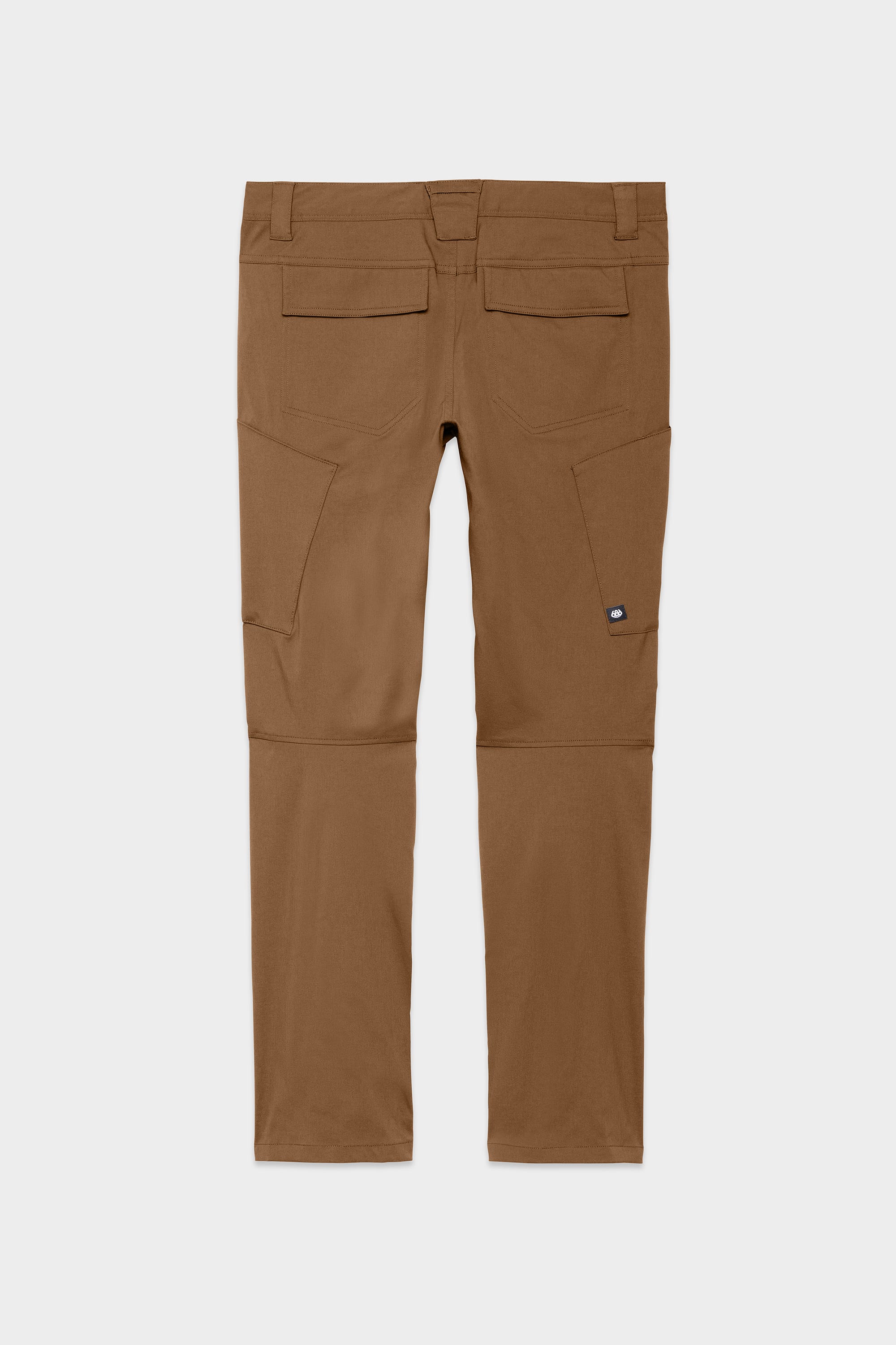 686 Mens Anything Cargo Pant - Slim Fit by 686, shown flat in rear view on a white background. Brown straight-leg technical pants made with breathable fabric and multiple pockets, including two front flaps and side thigh pockets.