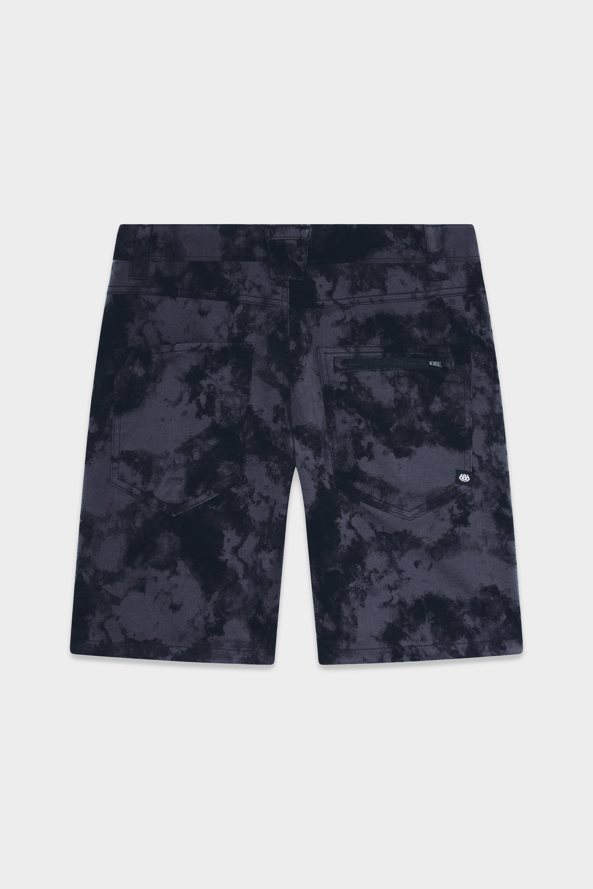 The 686 Mens Everywhere Hybrid Short in navy blue tie-dye is shown from the back, featuring two back pockets, a small logo tag on the right pocket, and a relaxed fit made from breathable fabric for all-day comfort.