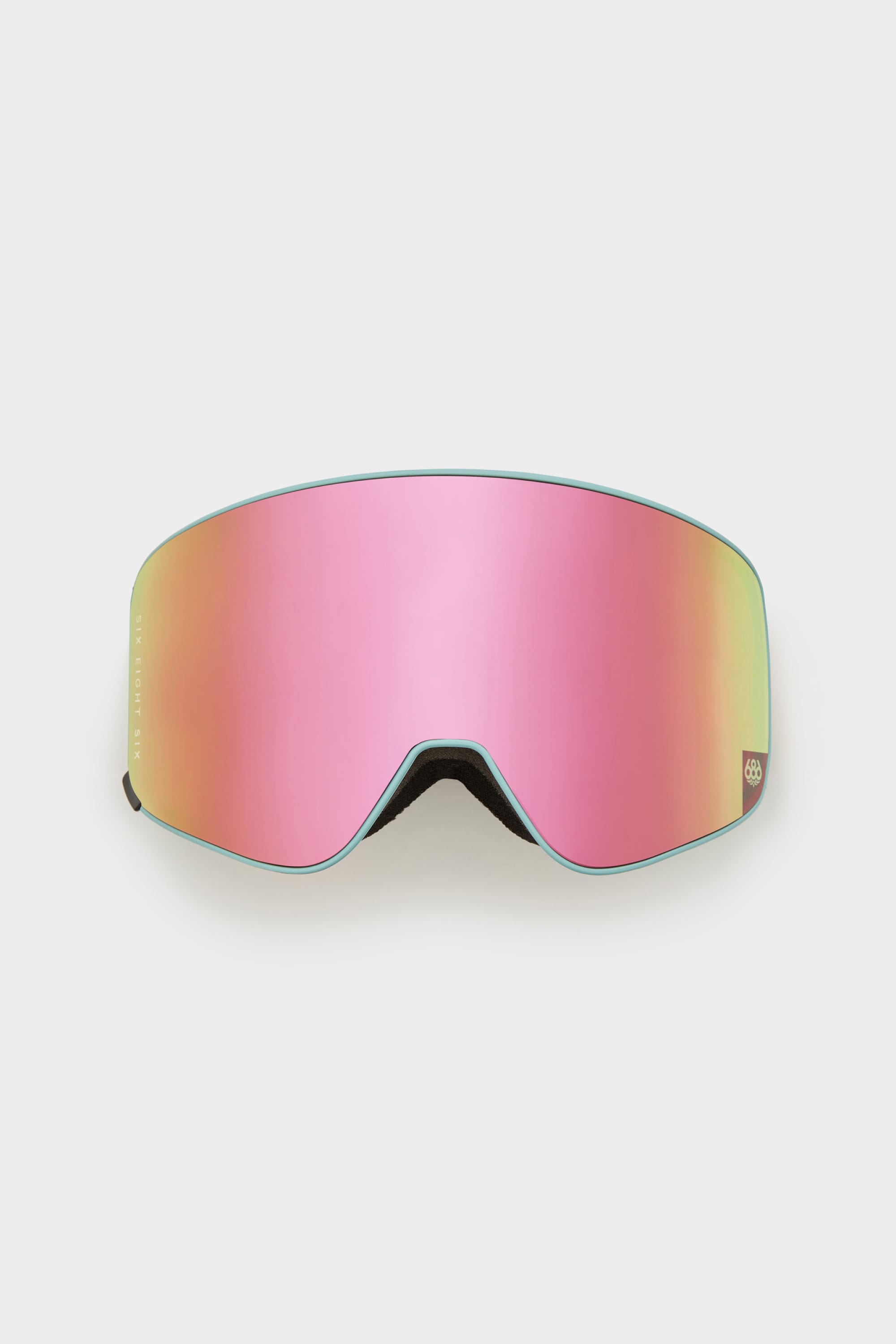 The 686 SMARTY Magnetic Goggle Replacement Lens by 686 features a wide, frameless pink-tinted design with minimal black trim and easy-swap magnetic lenses, shown against a plain white background.