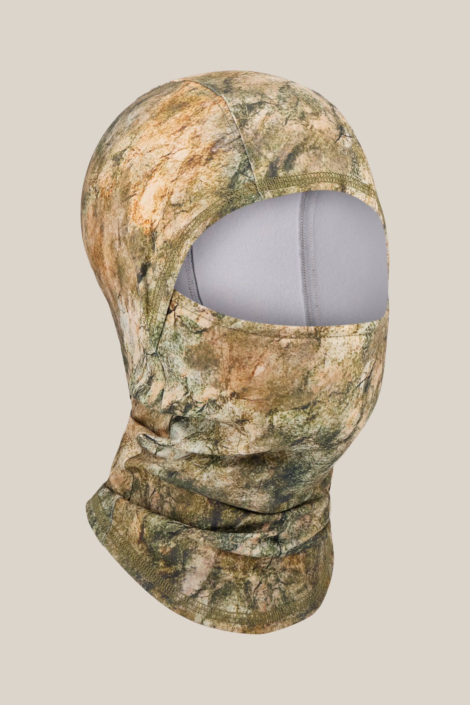 The 686 Hurra Hinged Balaclava by 686 is a unisex facemask featuring a camouflage pattern and an eye opening, displayed on a neutral beige background.