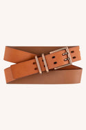 The 686 Westwell Voyager Belt by 686 is a tan leather belt featuring a rectangular metal buckle and two belt loops, neatly coiled against a light background.