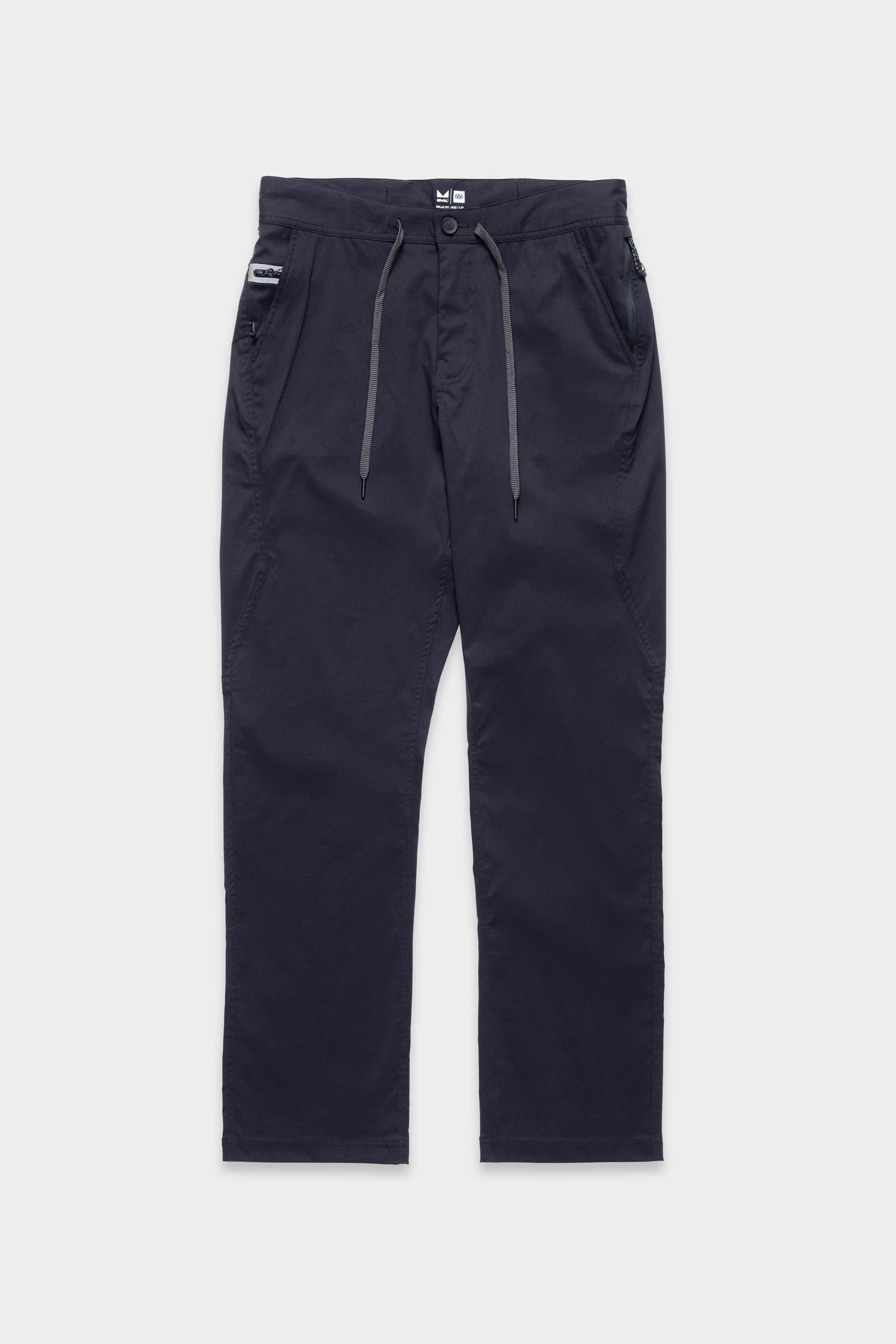 686 Mens Platform Bike Pant - Relaxed Fit by 686, in navy blue with drawstring waist, two side pockets, button and zip closure, and a small logo tag near the right pocket, shown on a white background.