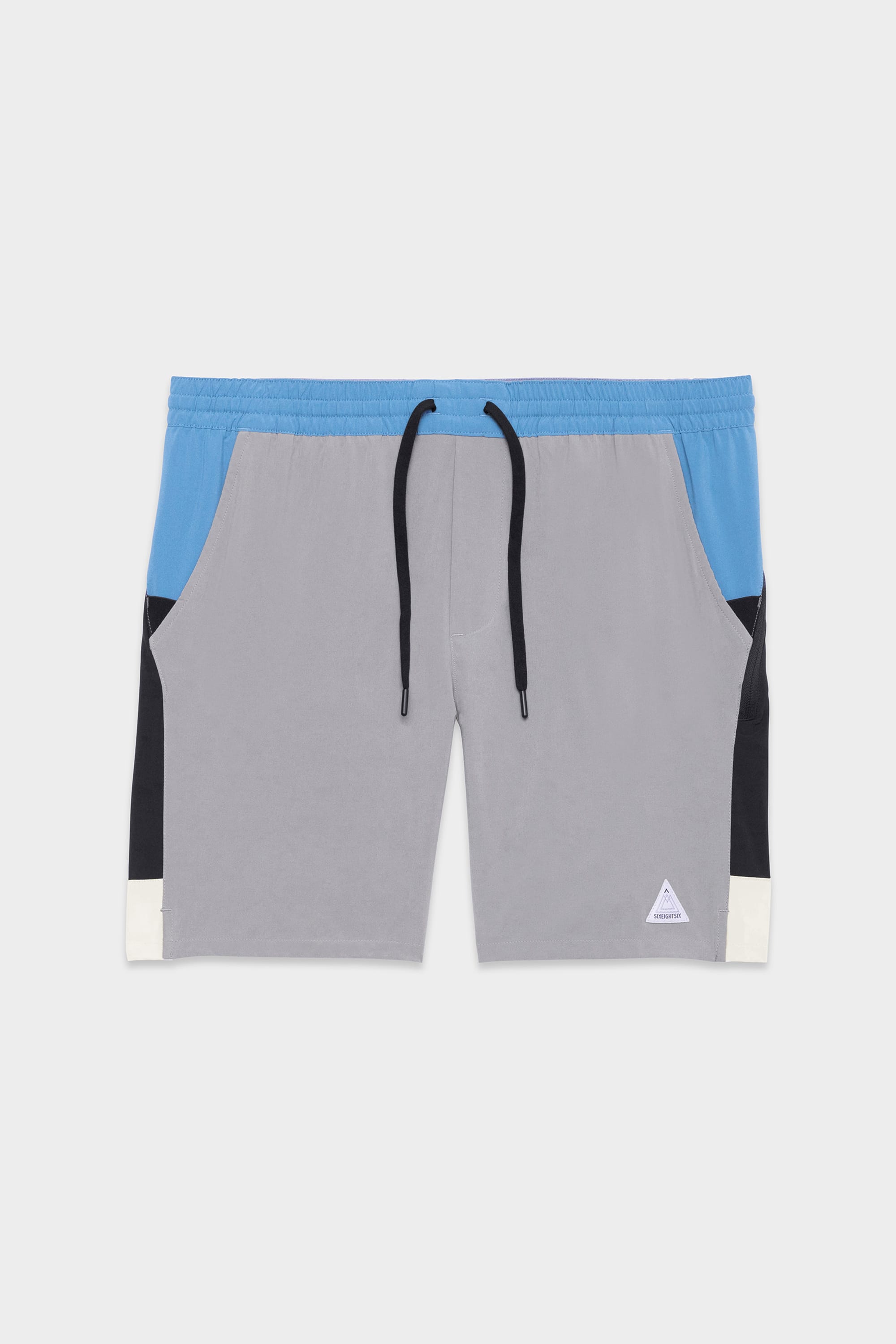 The 686 Mens ATP Stretch Performance Short features a light blue waistband, gray front, black side panels, white hem trim, black drawstrings, and a small white logo patch on the left leg. Shorts are laid flat on a white background. Brand: 686.