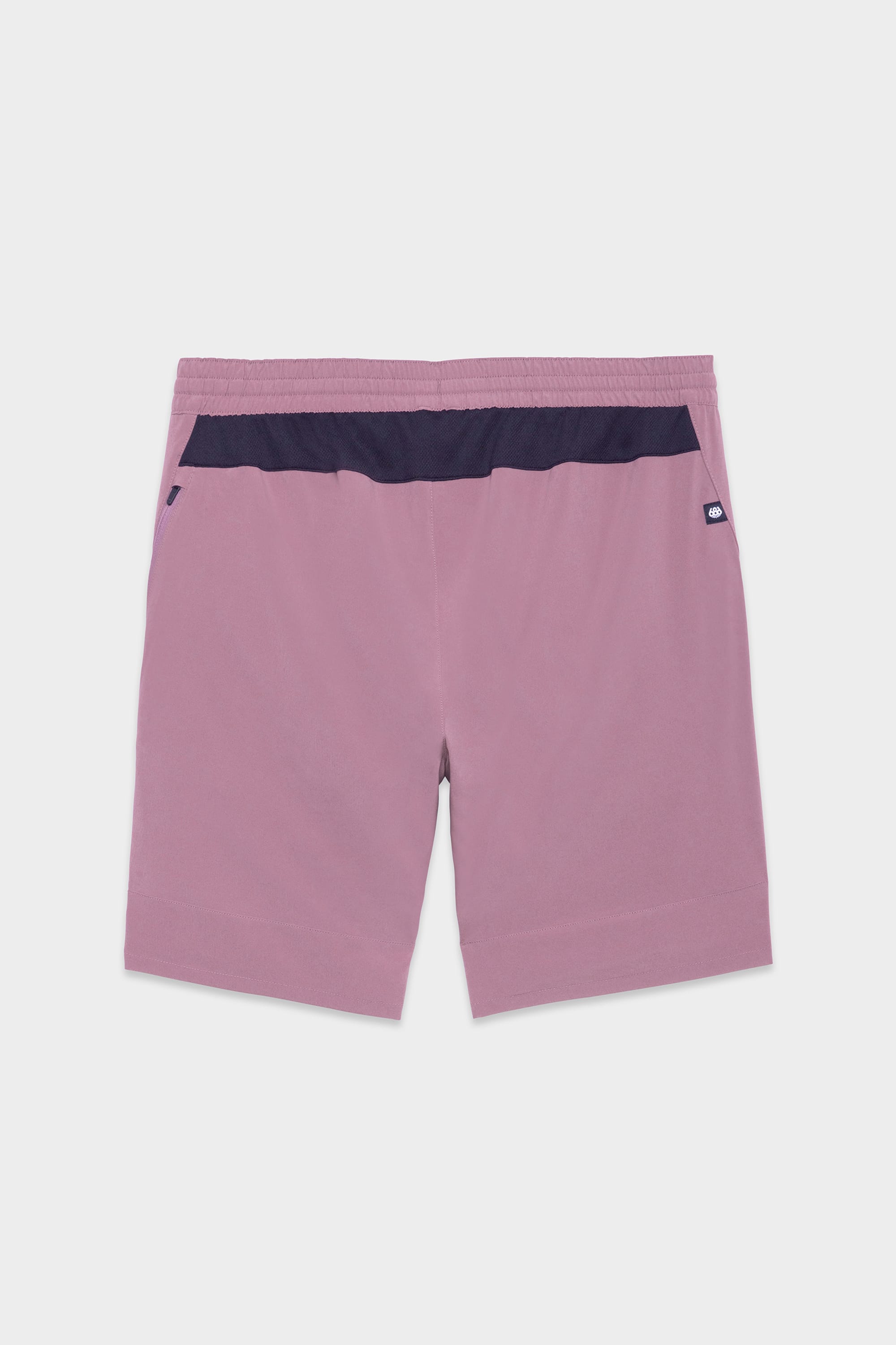 Back view of the 686 Mens ATP Stretch Performance Short in pink, featuring a black waistband with a small logo tag, shown against a plain white background.